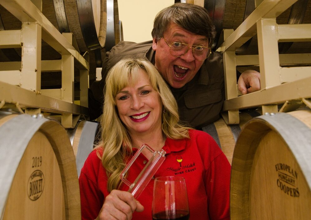 Mark and Maggie Malick having fun in the racks of barrels