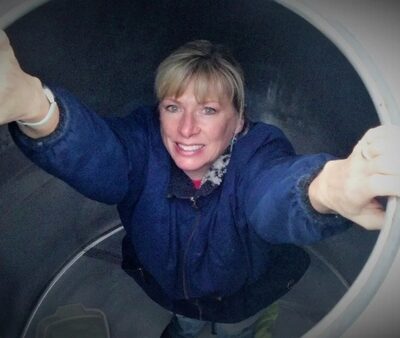 Maggie Malick inside steel fermenter